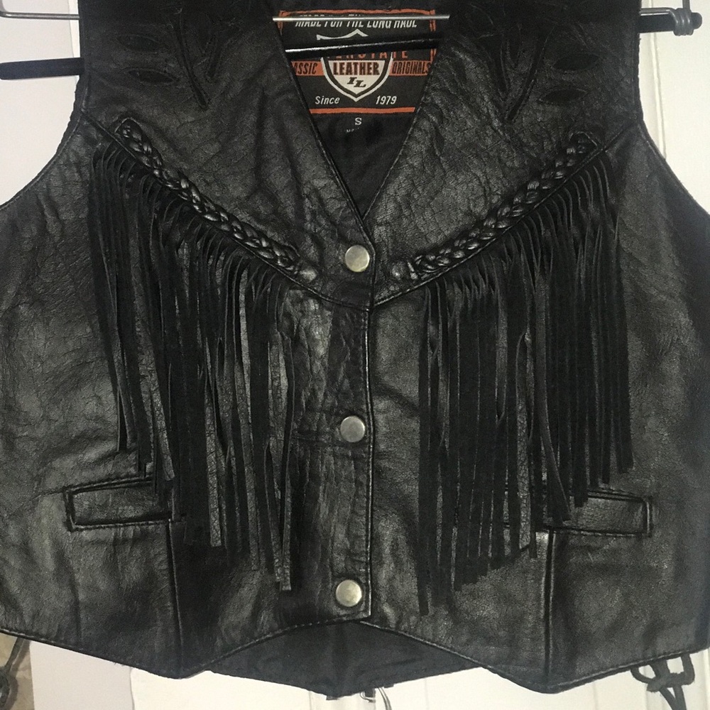 Ladies leather, fringed motorcycle vest.